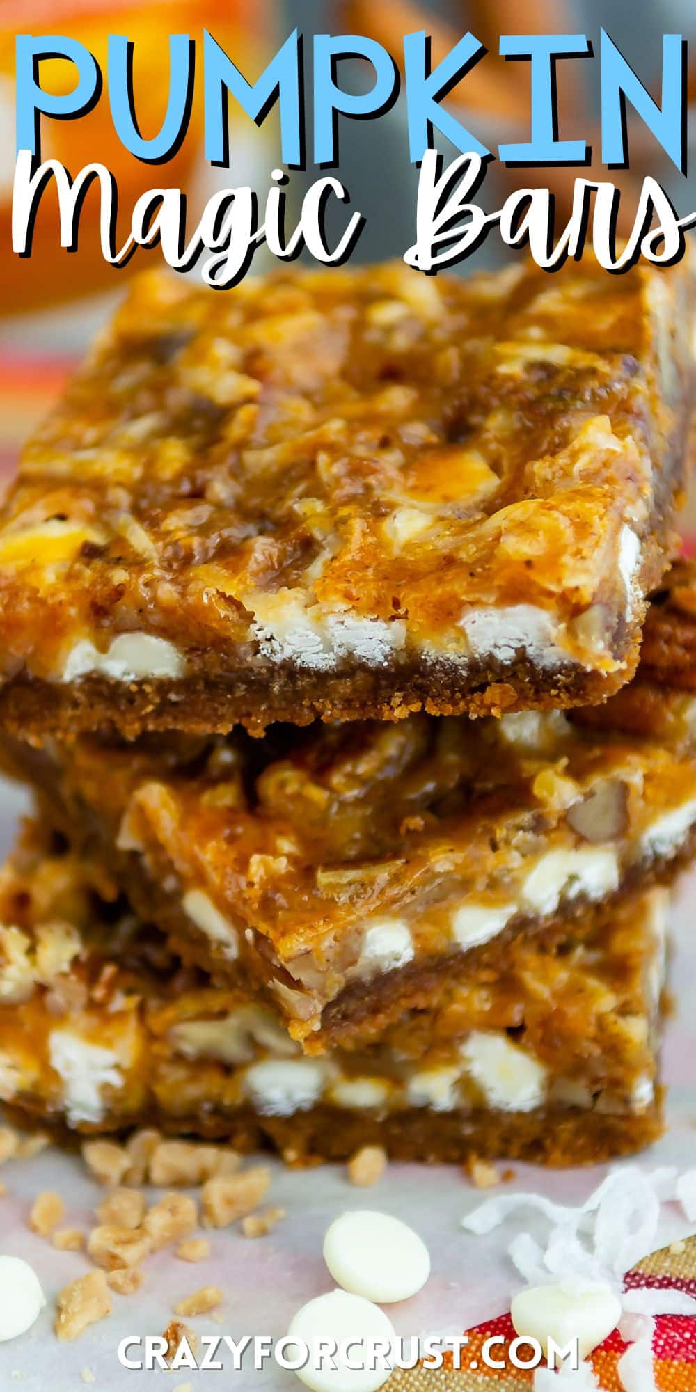 stacked pumpkin bars white white chocolate sprinkled around with words on the photo.