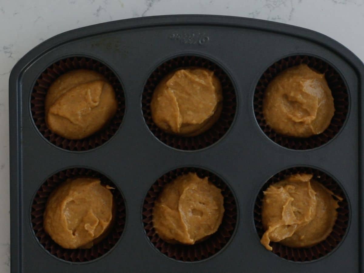 process shot of pumpkin muffins.