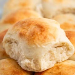 golden rolls in a white glass pan.