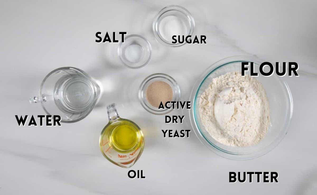 ingredients in quick dinner rolls laid out on a white counter.