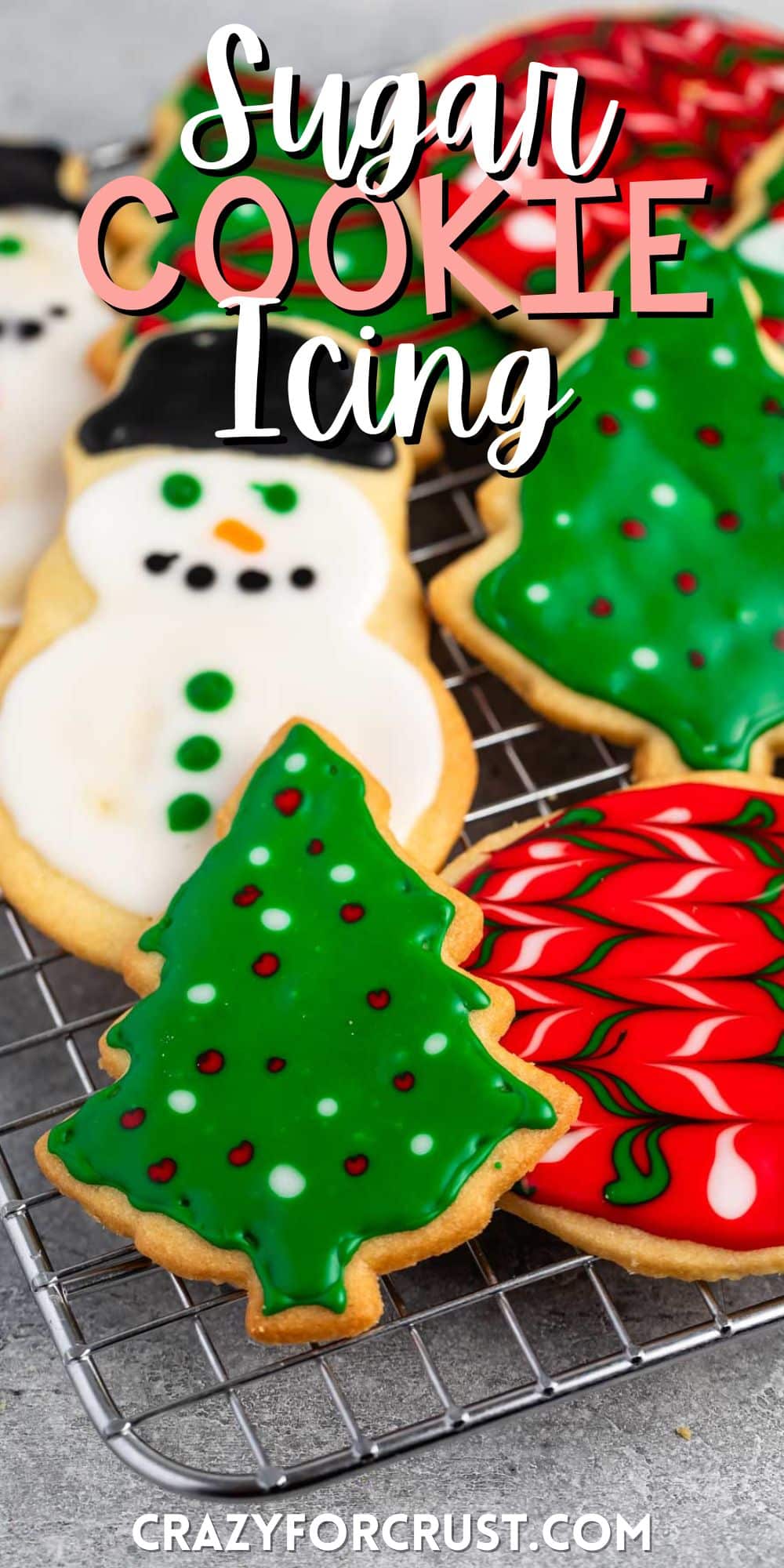 stacked christmas cookies in shapes like trees and snowmen with correlating frosting with words on the image.