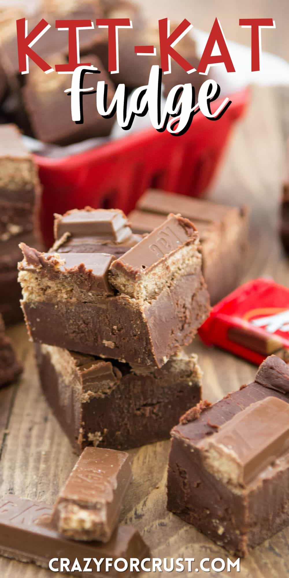 stacked fudge with KitKats on top near wrapped KitKats with words on the image.