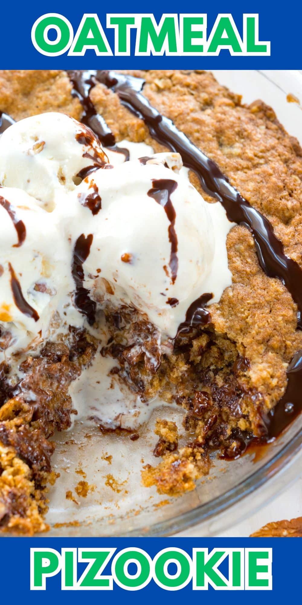 oatmeal cookie in pie plate with ice cream and chocolate sauce.