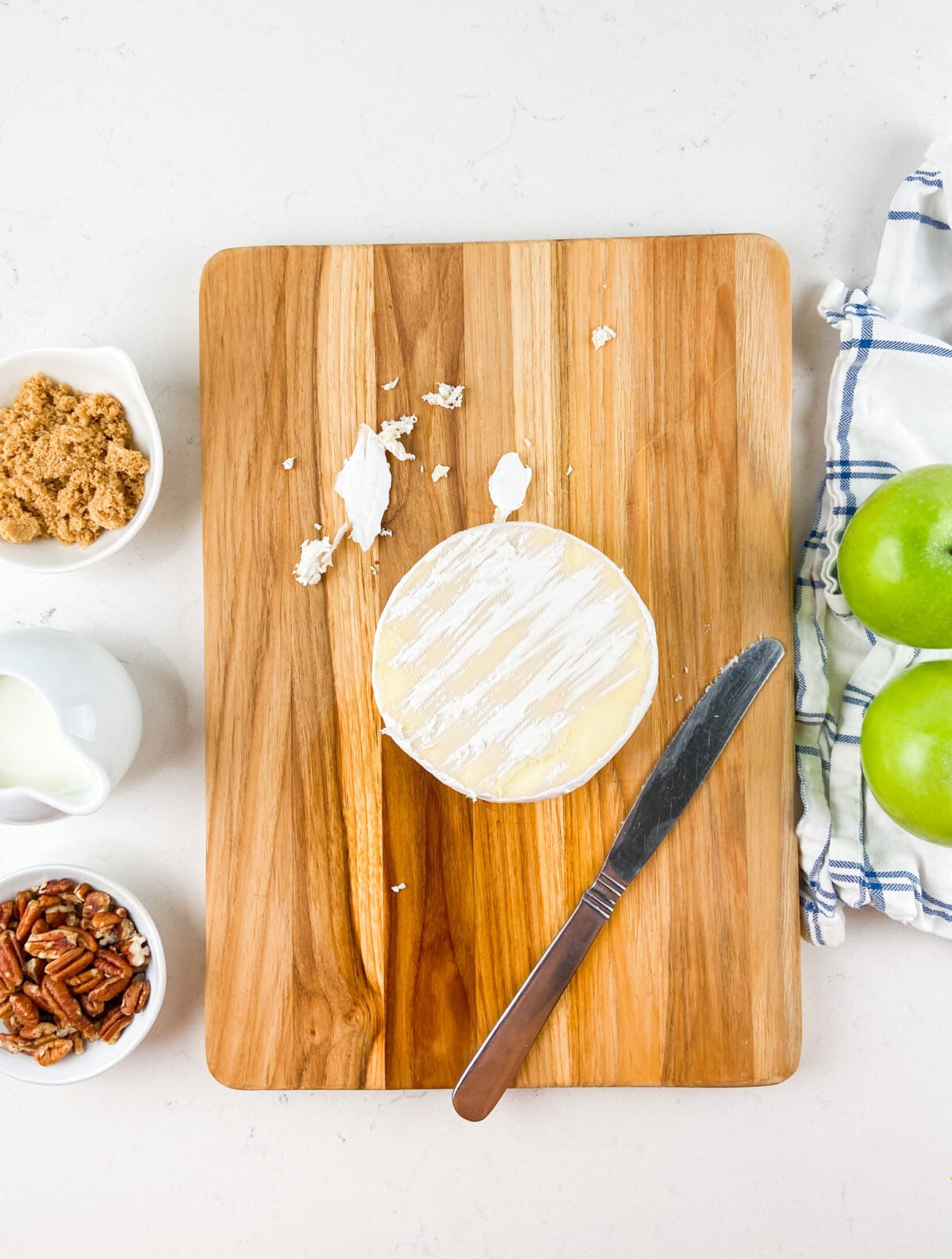 process shot of pecan apple baked brie.