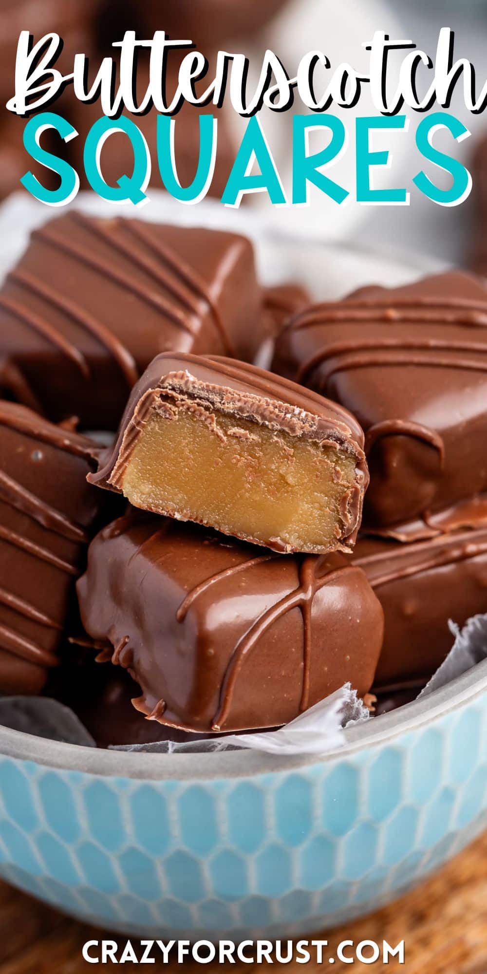 stacked butterscotch squares covered in chocolate in a light blue bowl with words on the image.