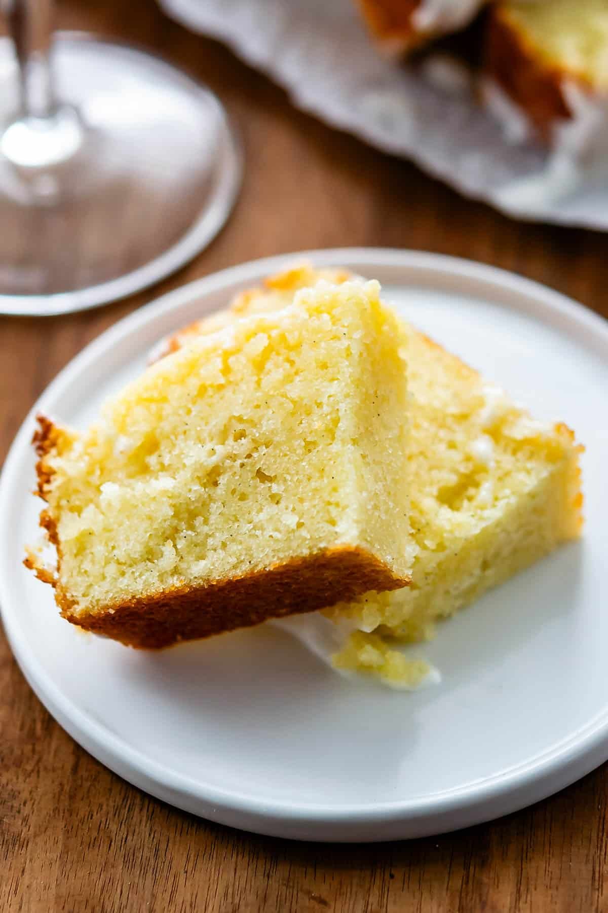 sliced pound cake on a white plate.