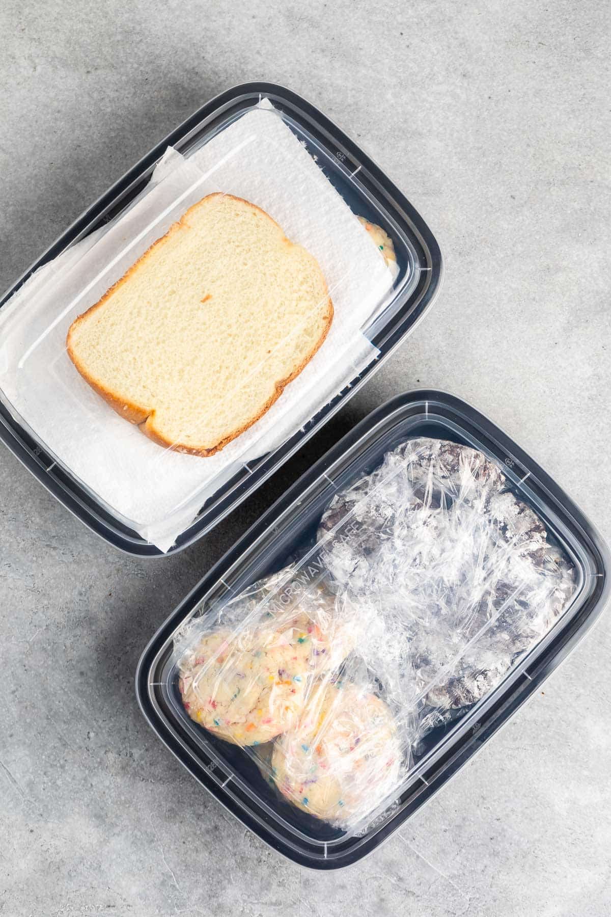 cookie containers, one with bread.