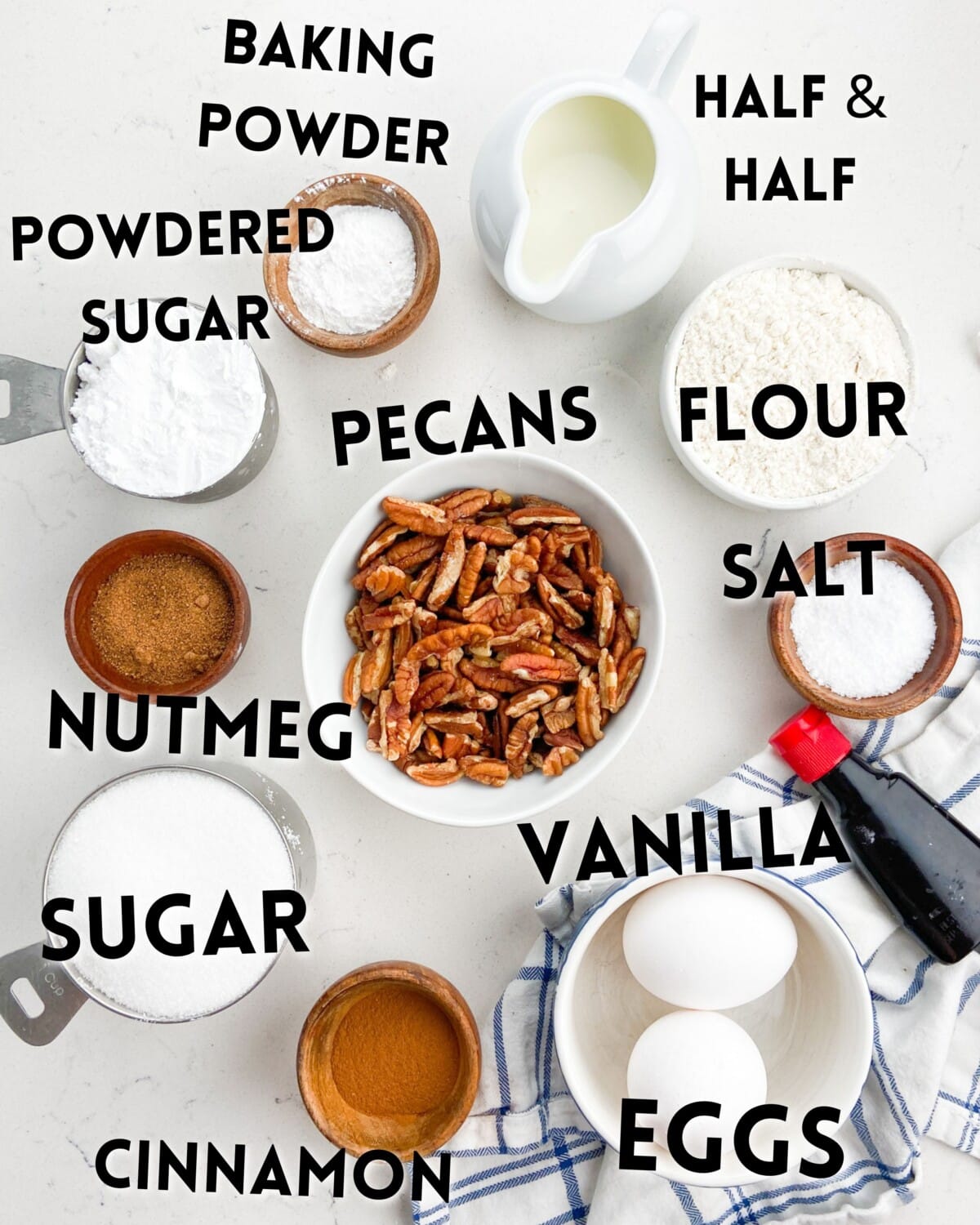 ingredients in cinnamon pecan cookies laid out on a marble counter.