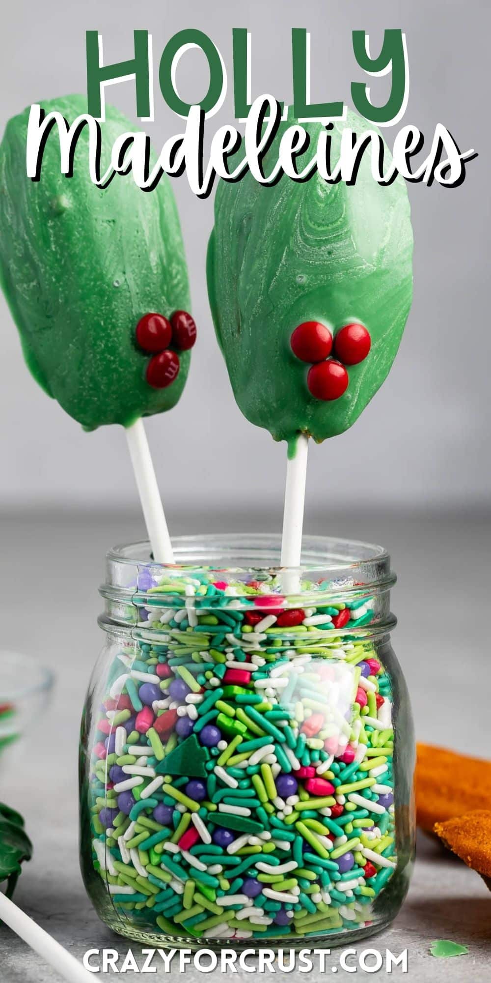 madeleines covered in green chocolate standing up in sprinkles with words on the image.