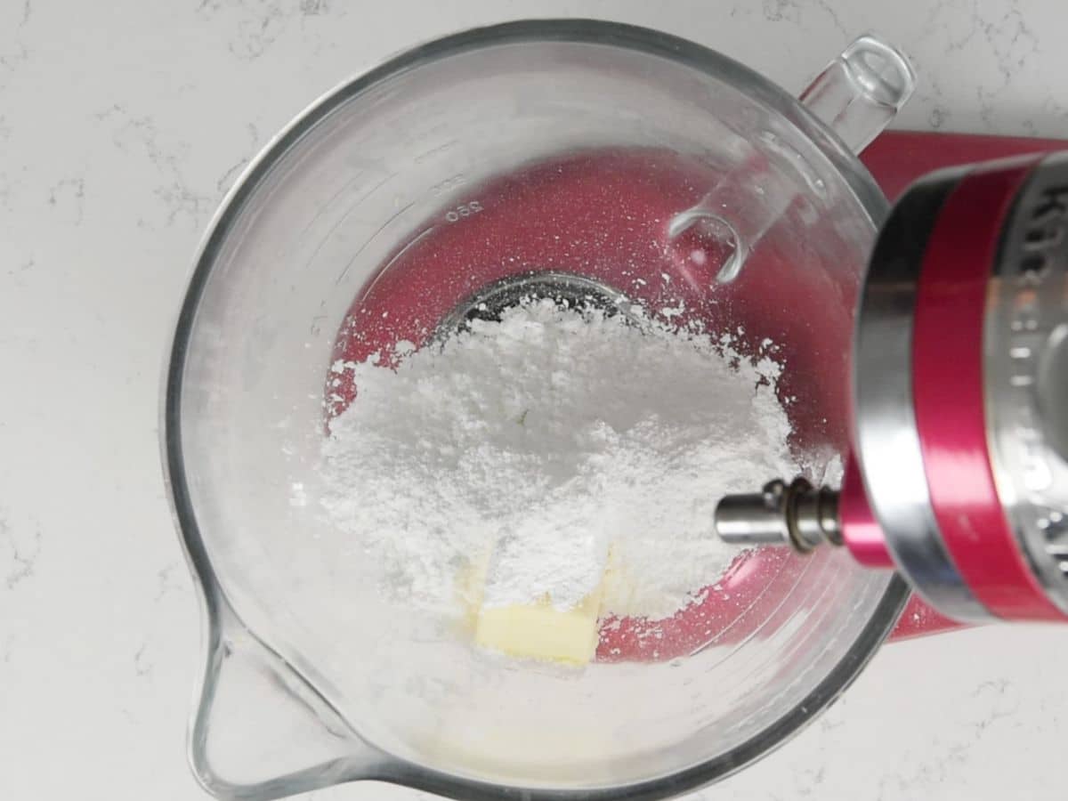 powdered sugar and butter in a stand mixer