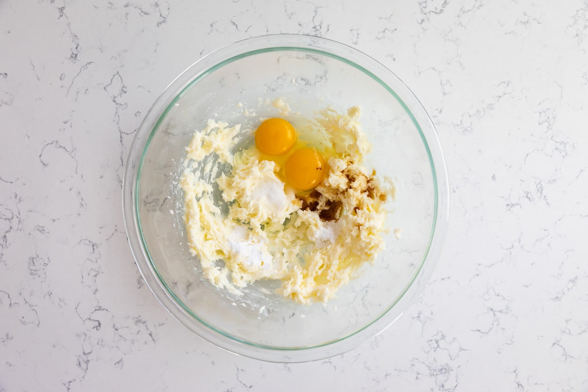 bowl with creamed butter and sugar and eggs, and vanilla.