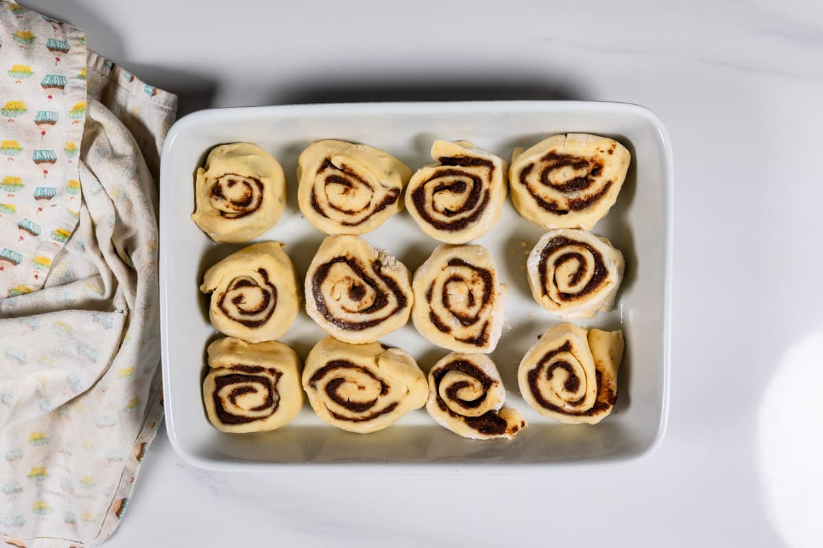 process shot of gingerbread cinnamon rolls.