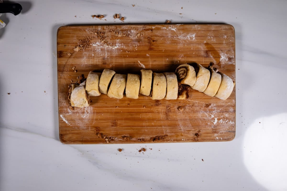 process shot of eggnog cinnamon rolls.