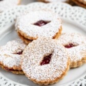 liner cookies on white plate with challenge box behind