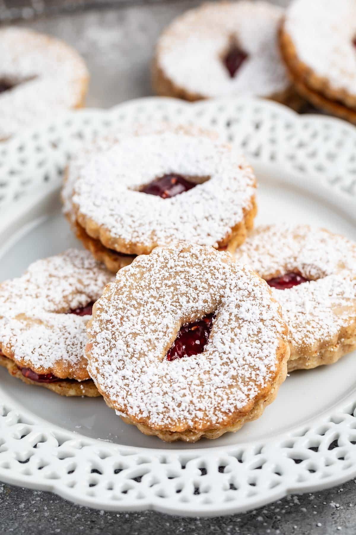 liner cookies on white plate with challenge box behind