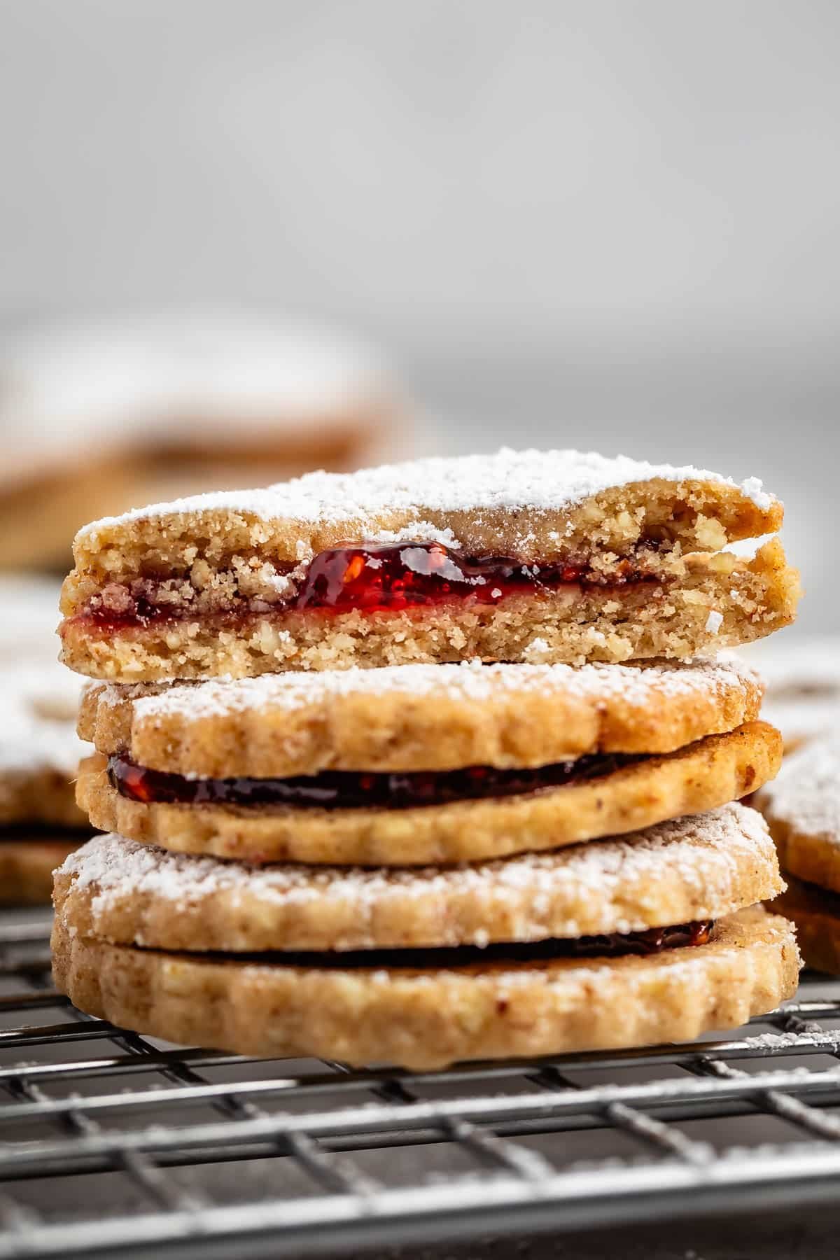 stack of 3 cookies with one cut in half.