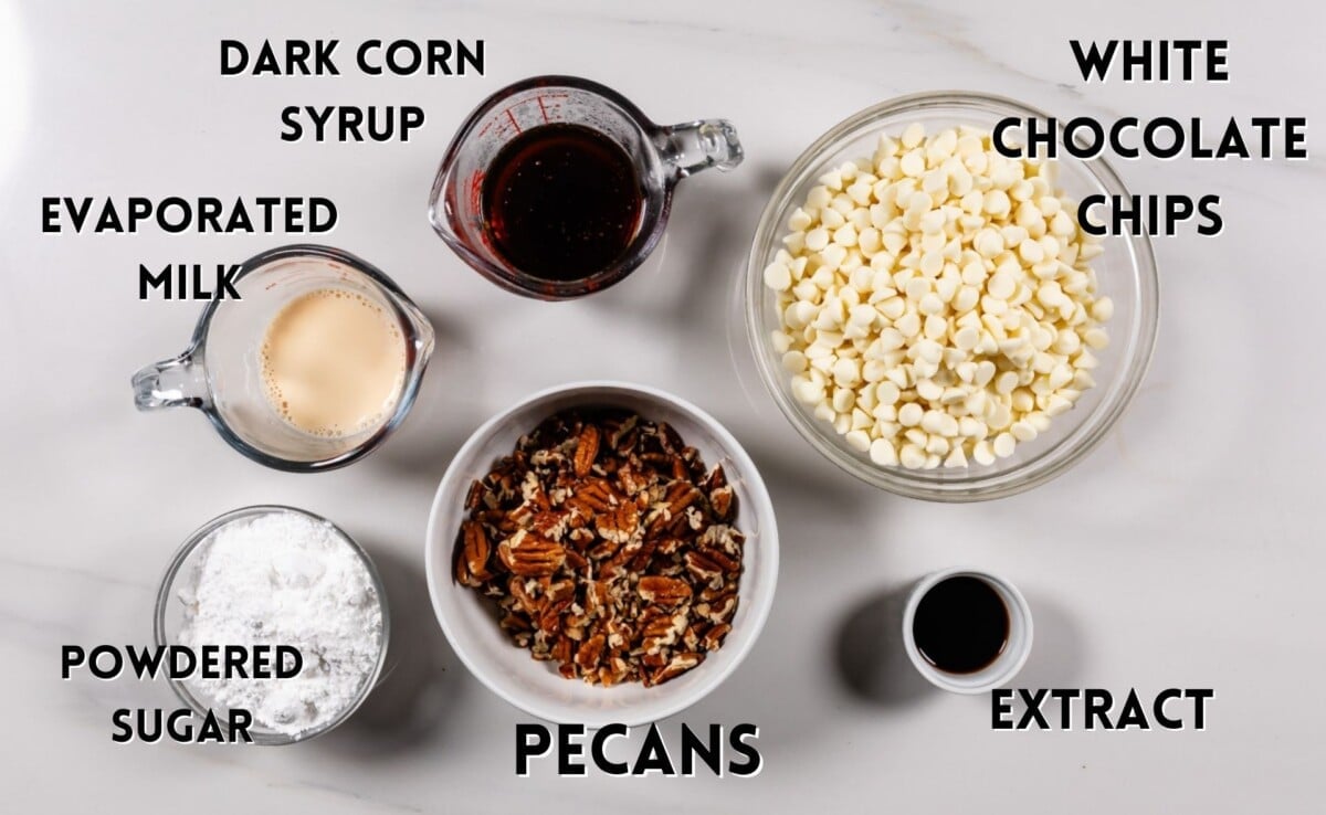 ingredients in pecan pie fudge laid out on a marble counter top.