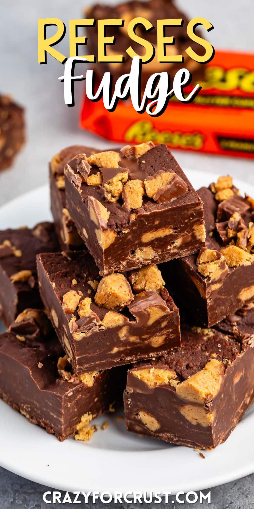 stacked brown reeses fudge on a white plate with words on the image.