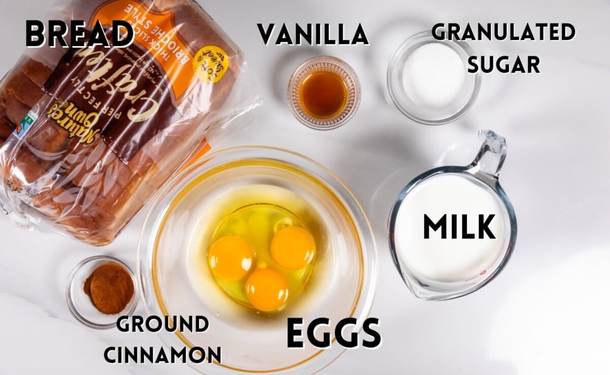 ingredients in French toast laid out on a marble counter.