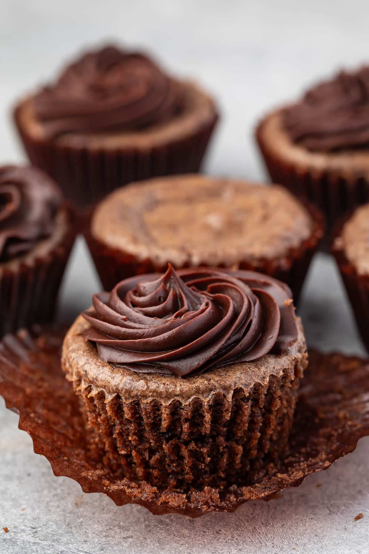 cupcake made of brownies with chocolate frosting on top.