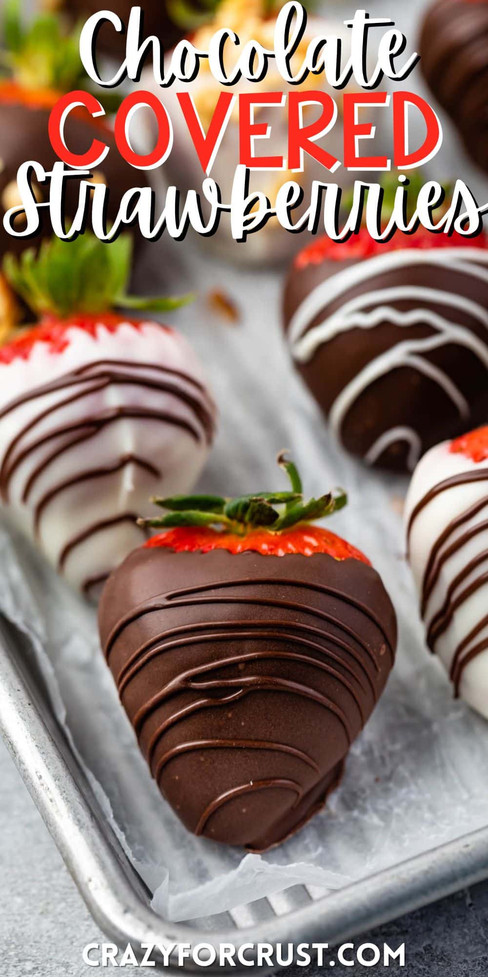 brown and white chocolate covered strawberries on top of a metal sheet pan with words on the image.