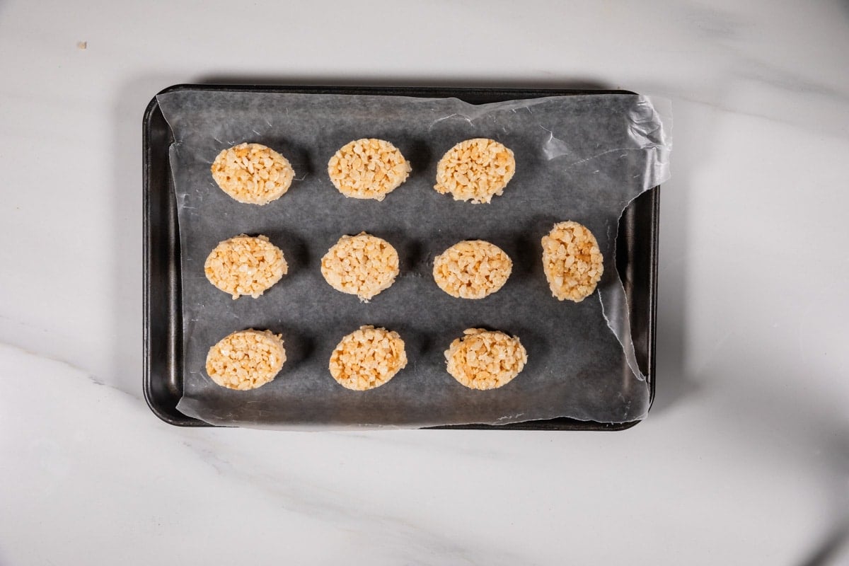 process shot of making football Rice Krispie treats.