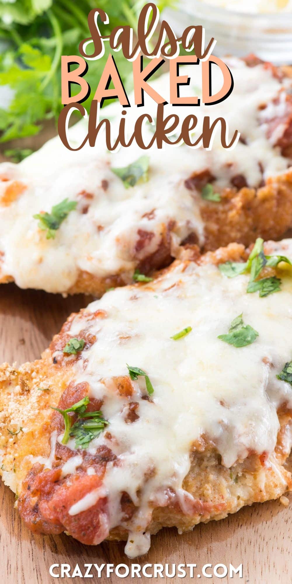 chicken breasts covered in sauce and cheese on a cutting board with words on the image.