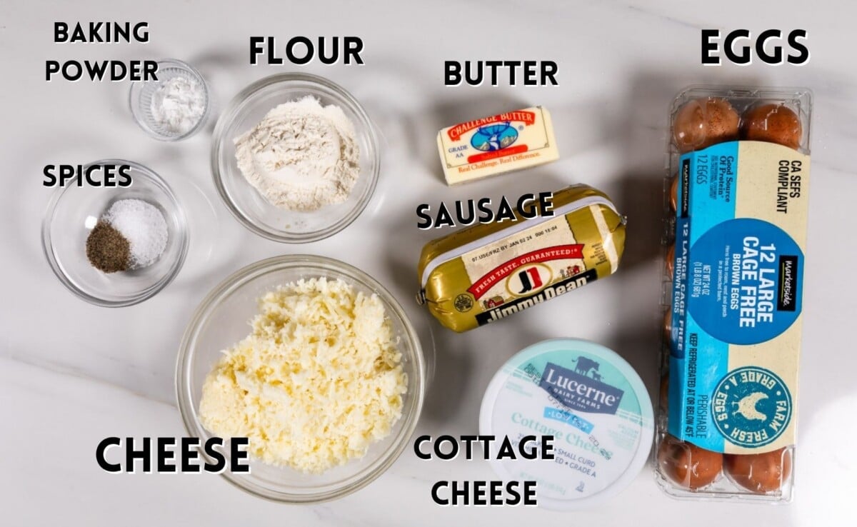 ingredients in sausage egg casserole laid out on a marble counter.