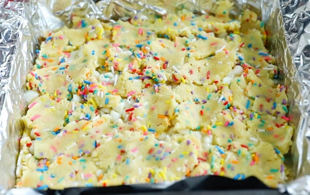 process shot of funfetti gooey bars being made.