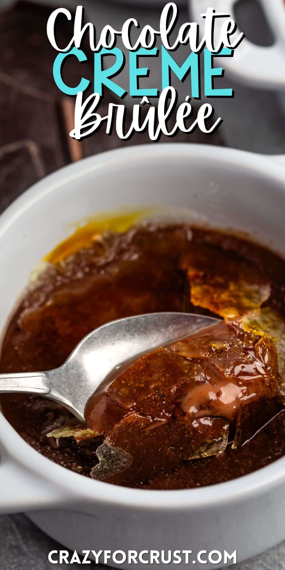 chocolate creme brûlée in a white mug with words on the image.