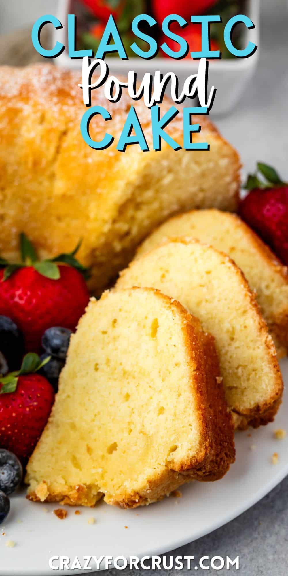 sliced pound cake on a white plate next to strawberries and blueberries with words on the image.