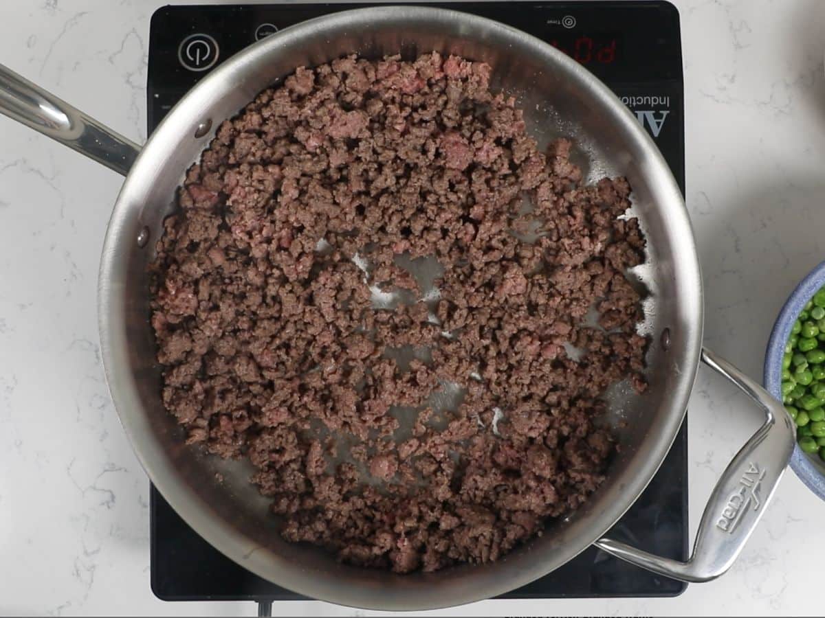 process shot of hamburger tater tot casserole.