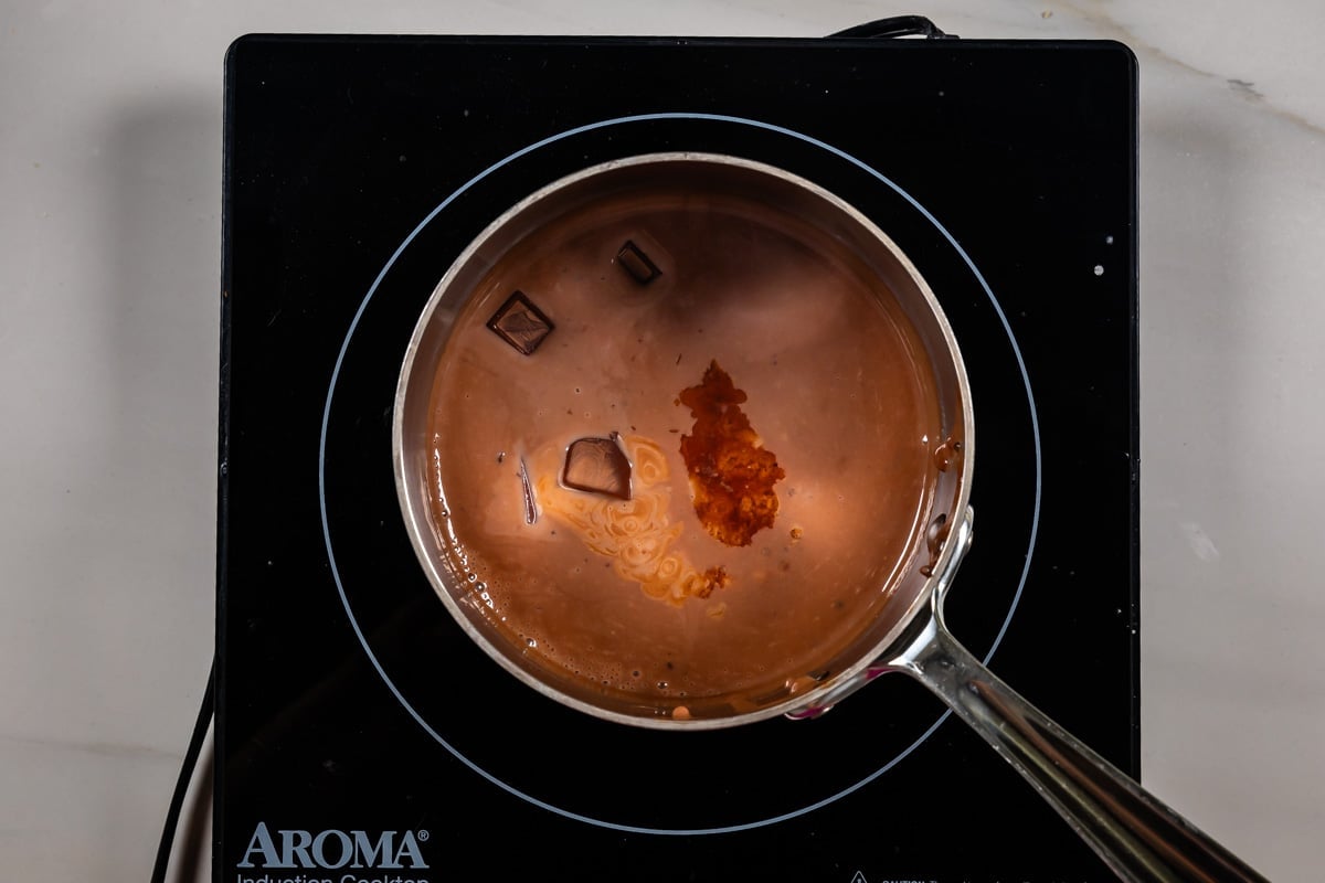 process shot of chocolate creme brûlée being made.