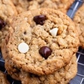 stacked oatmeal cookies with white and regular chocolate chips baked in.