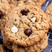 stacked oatmeal cookies with white and regular chocolate chips baked in.