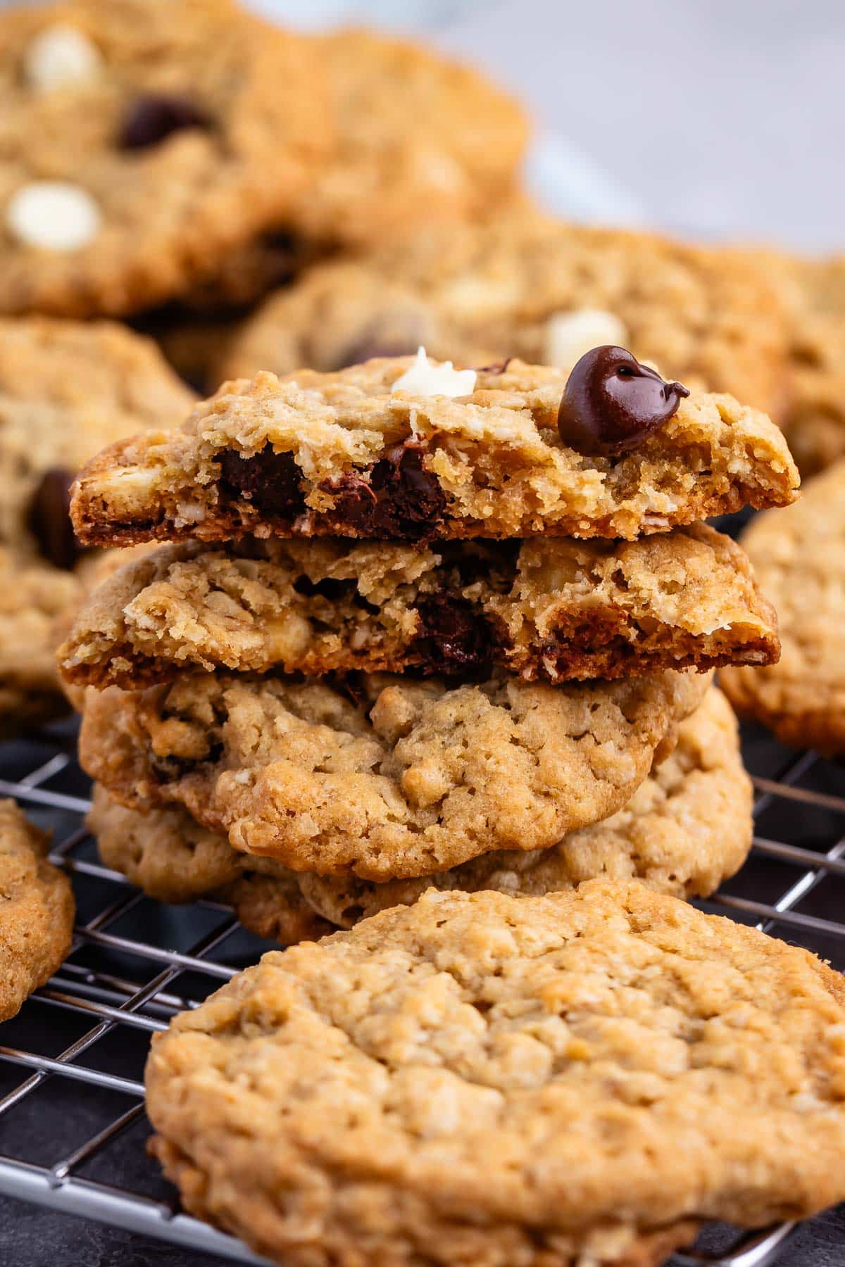 stacked oatmeal cookies with white and regular chocolate chips baked in.