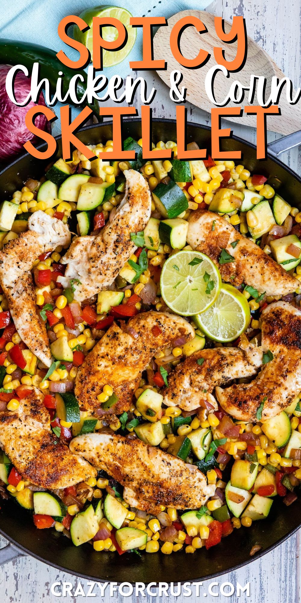chicken and vegetables in a black skillet with words on the image.