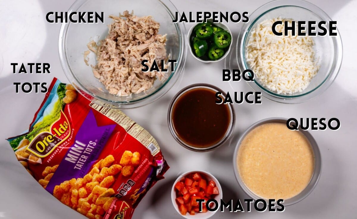 ingredients in barbecue chicken totchos laid out on a white marble counter.