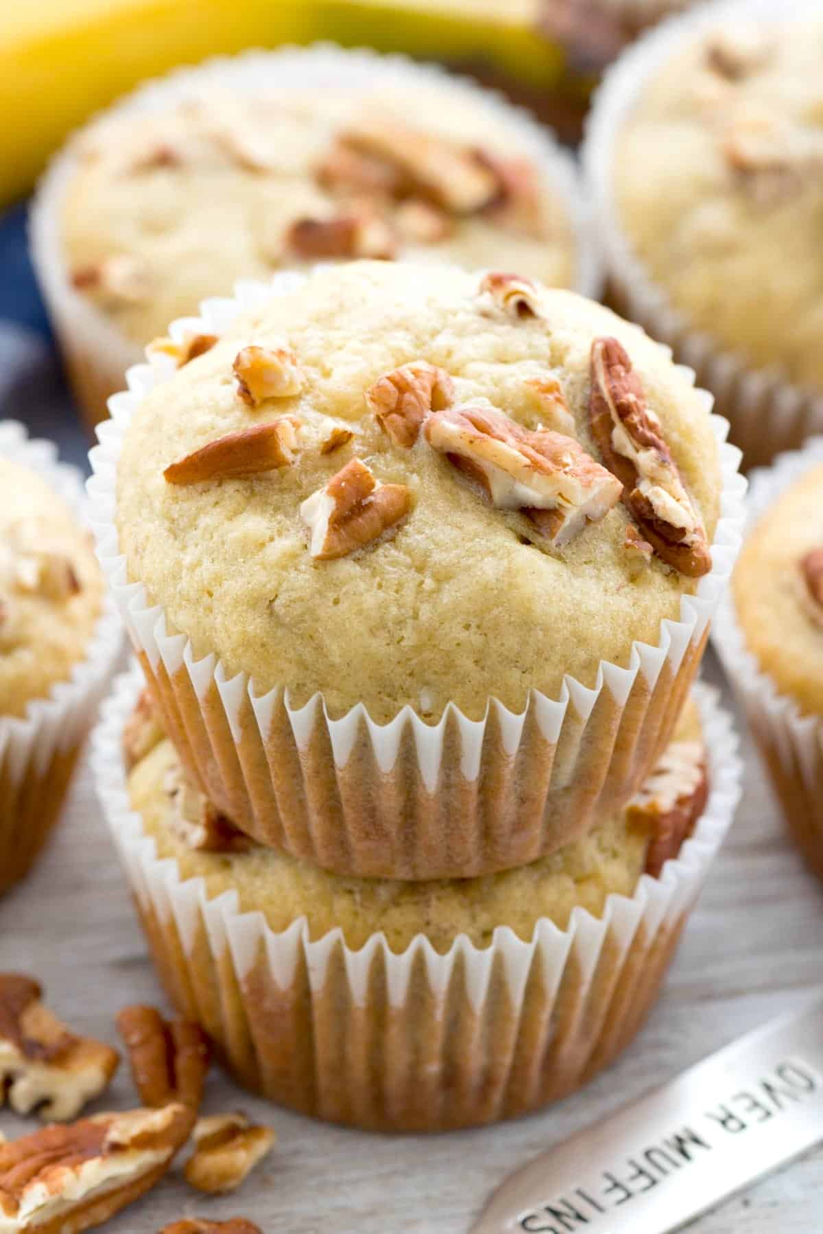 stacked banana muffins with cream cheese and pecan baked in.