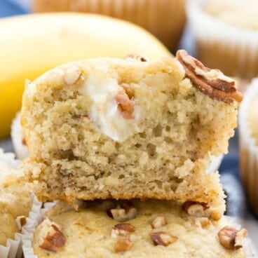 stacked banana muffins with cream cheese and pecan baked in.