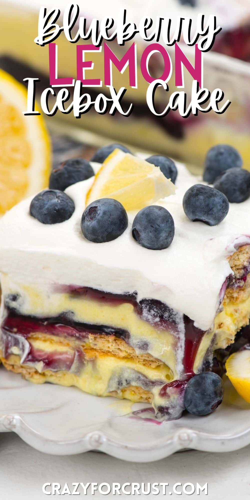 square slice of cake with blueberries and lemons on top with words on the image.