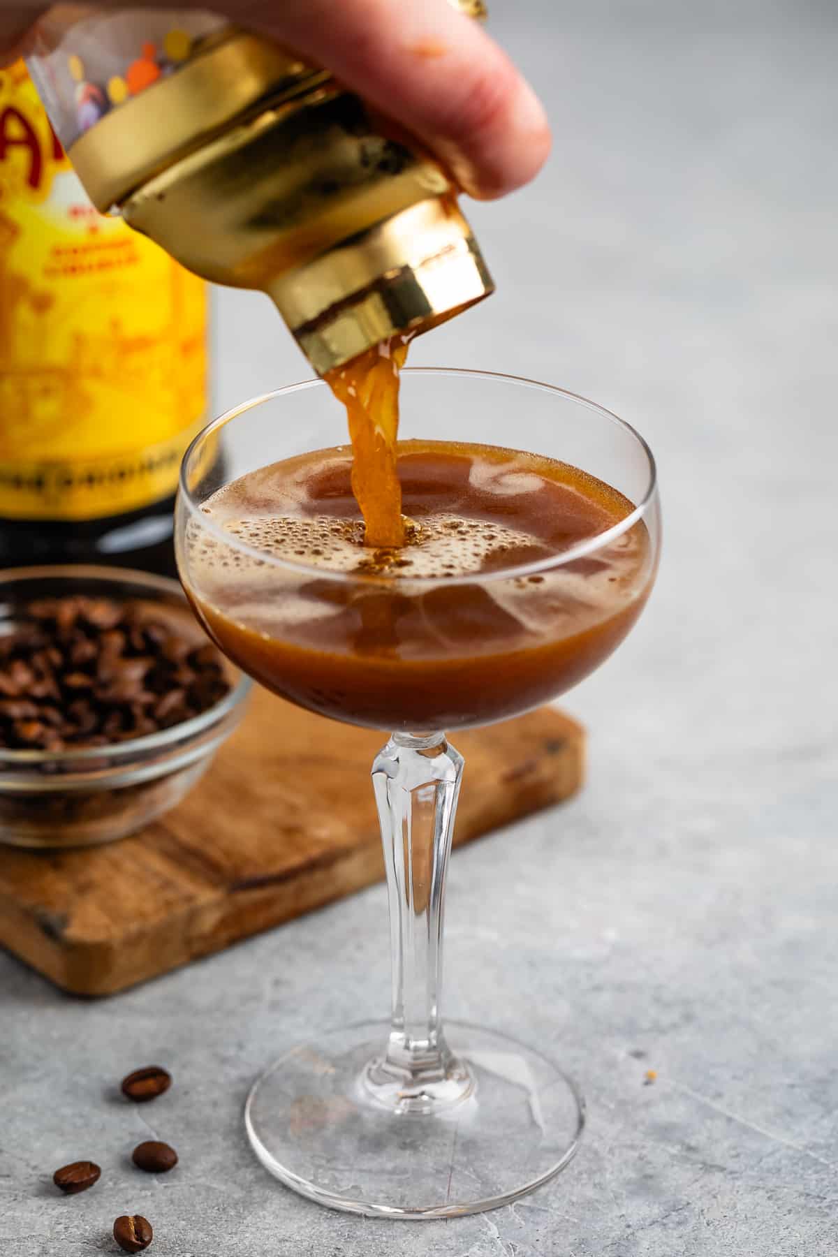process shot of espresso martini being made and poured.