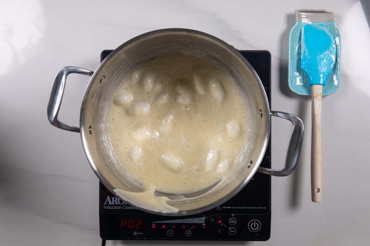 process shot of lucky charms Rice Krispie treats being made.