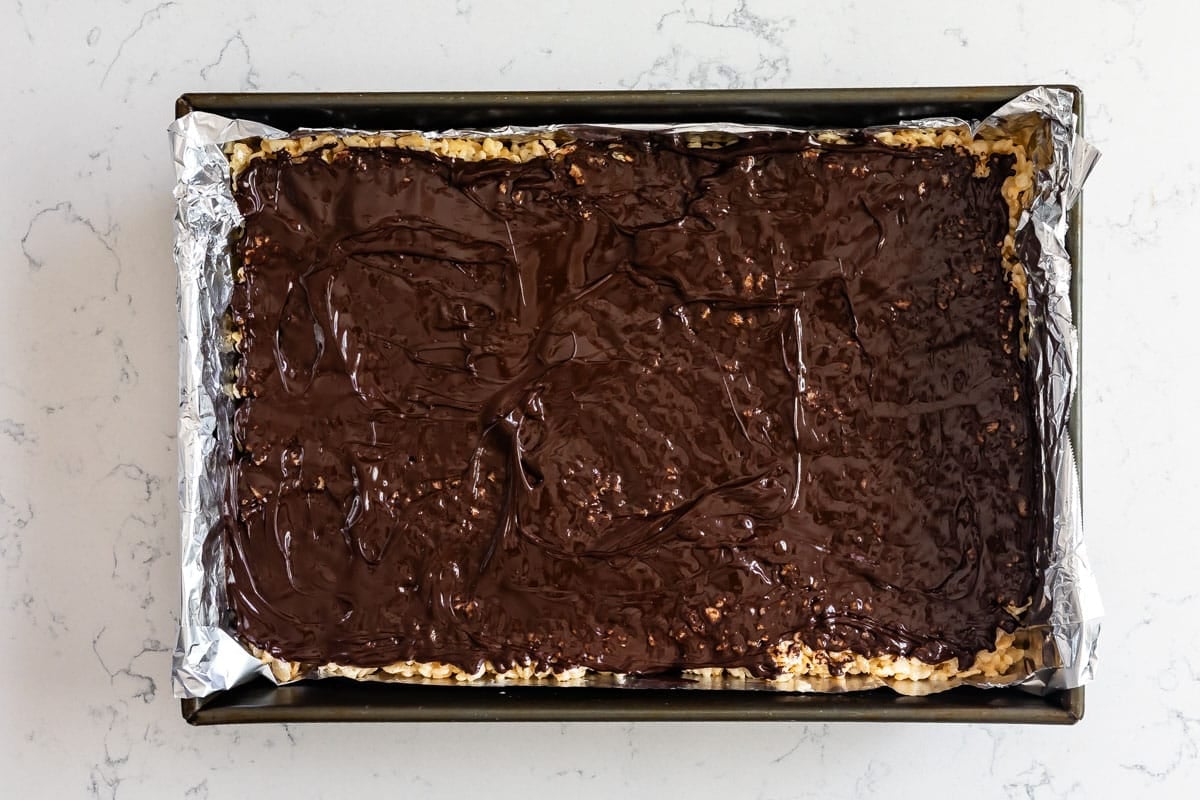 process shot of smores Rice Krispie treats being made.