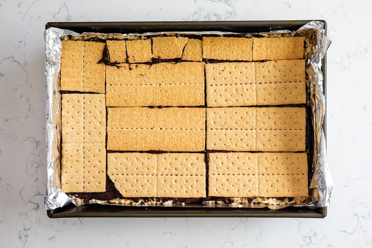 process shot of smores Rice Krispie treats being made.