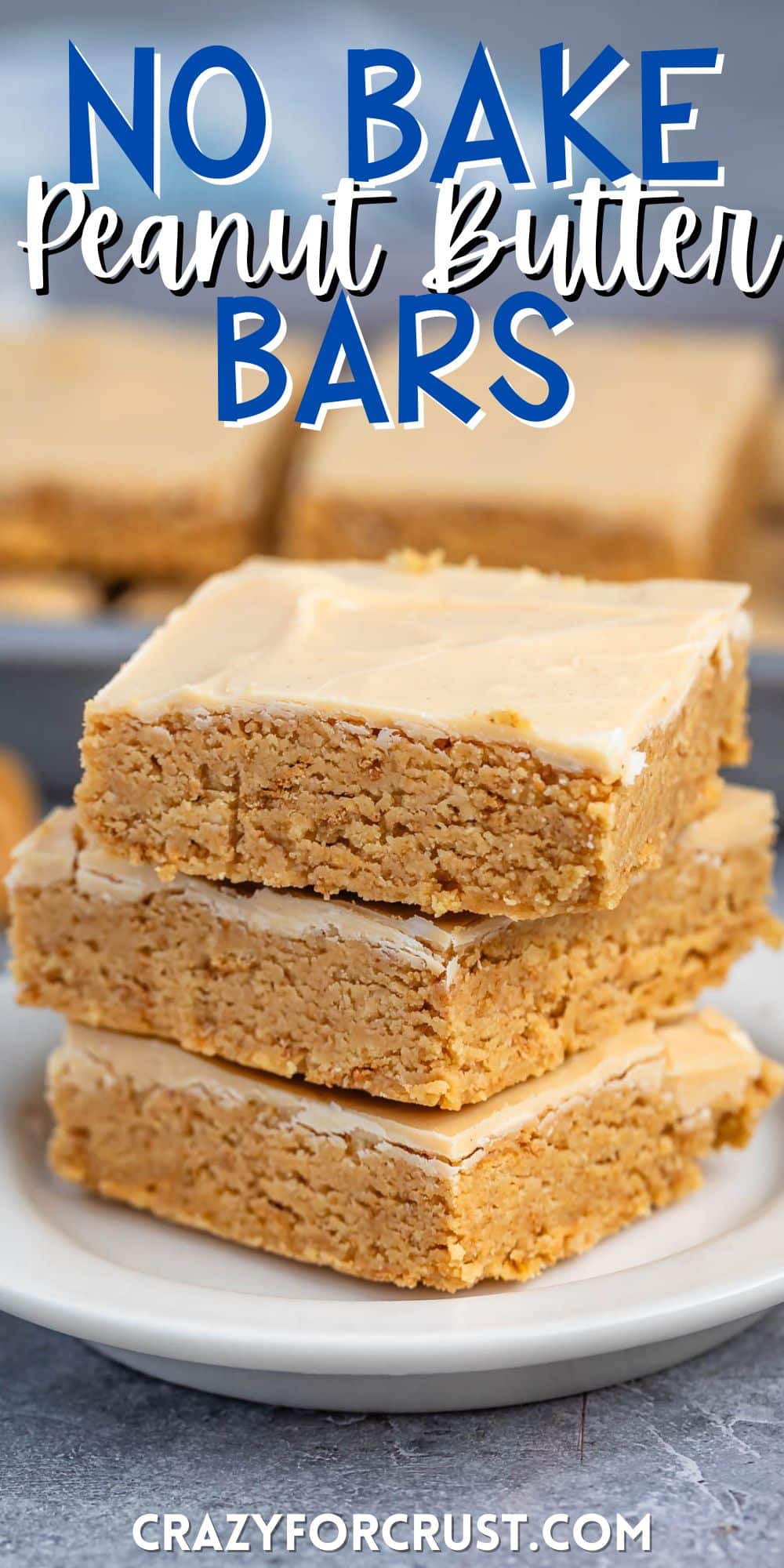 stacked peanut butter bars on a white plate with words on the image.