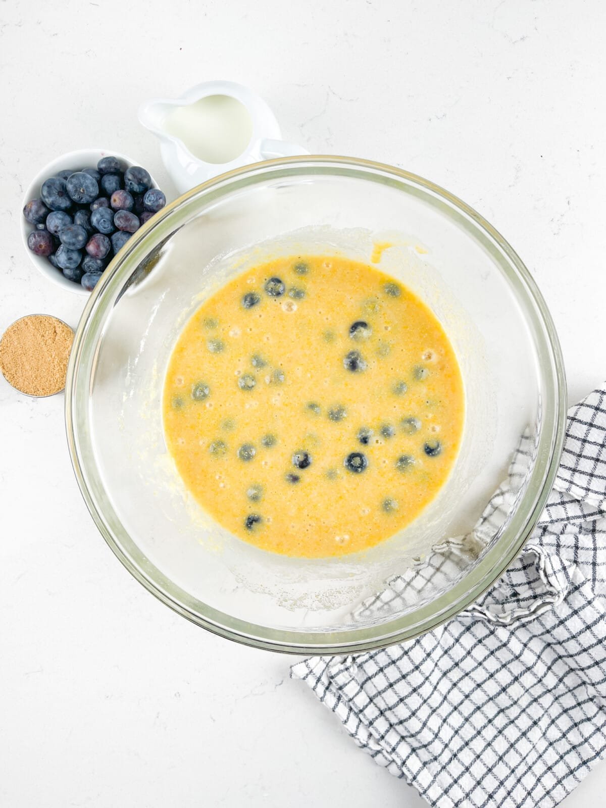 process shot of blueberry cornbread being made.