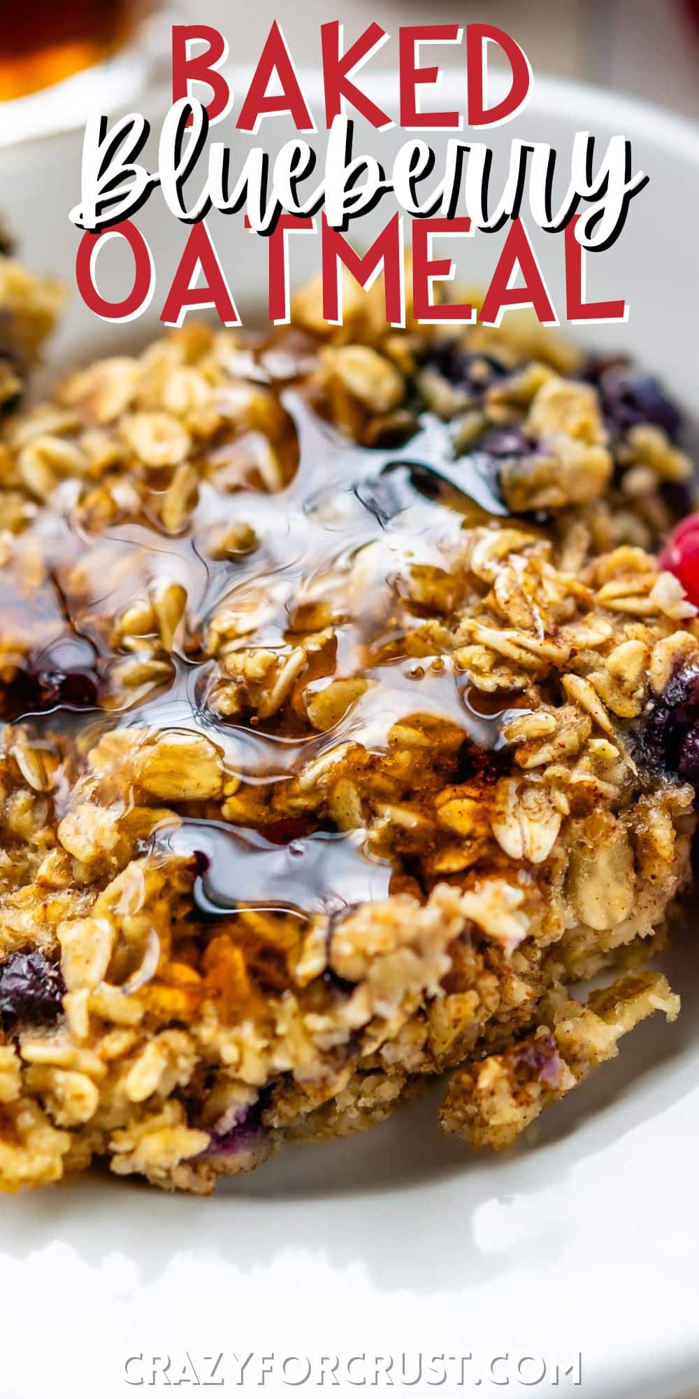 oatmeal in a white plate next to raspberries with words on the image.