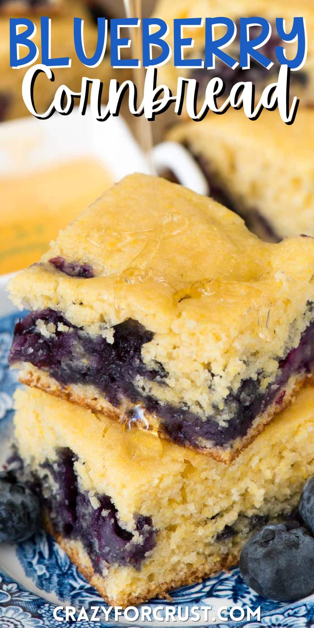 stacked cornbread on a blue and white plate surrounded by blueberries with words on the image.