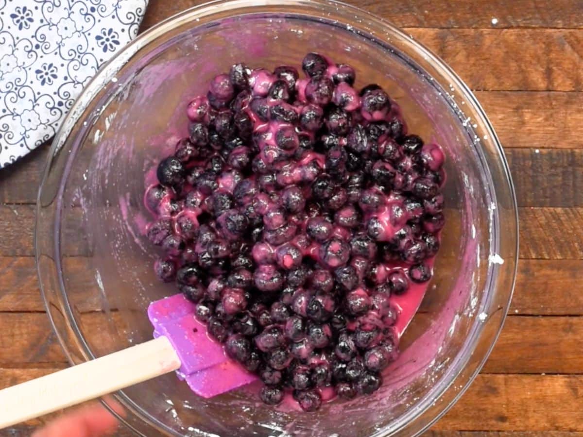 process shot of blueberry lattice pie.